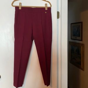 Pair of Black and pair of Maroon Calvin Klein leggings. Been Dry Cleaned.